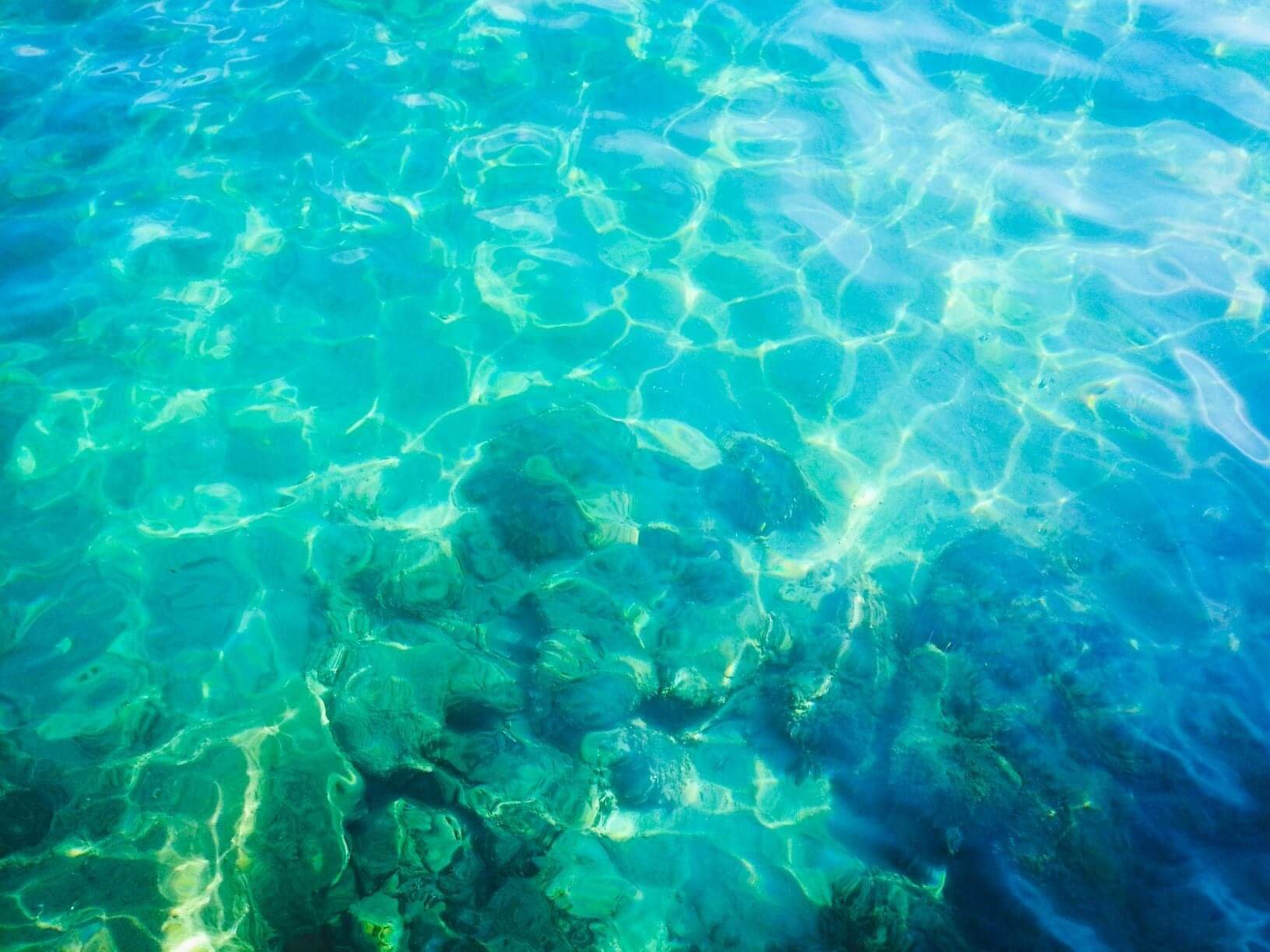 Kristallklart vatten Sirene Blue Resort på Poros